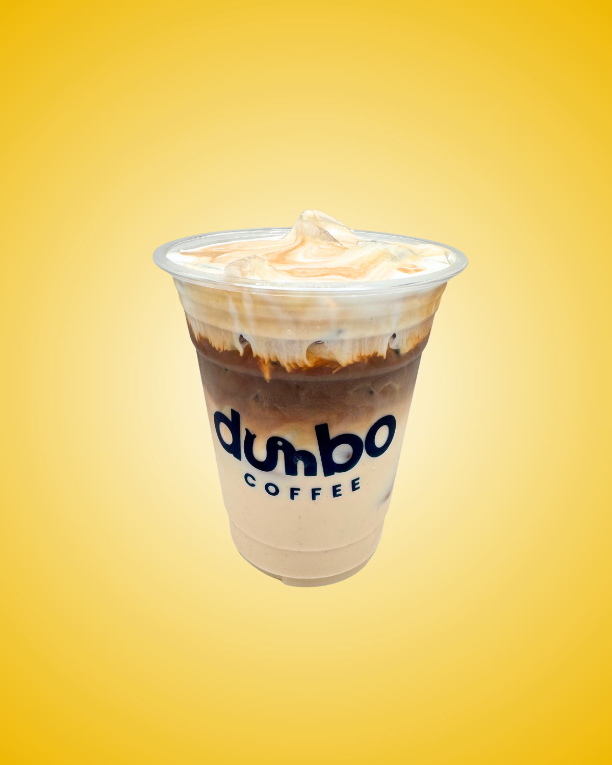 Iced Sea Salt Latte topped with cream in a Dumbo Coffee cup